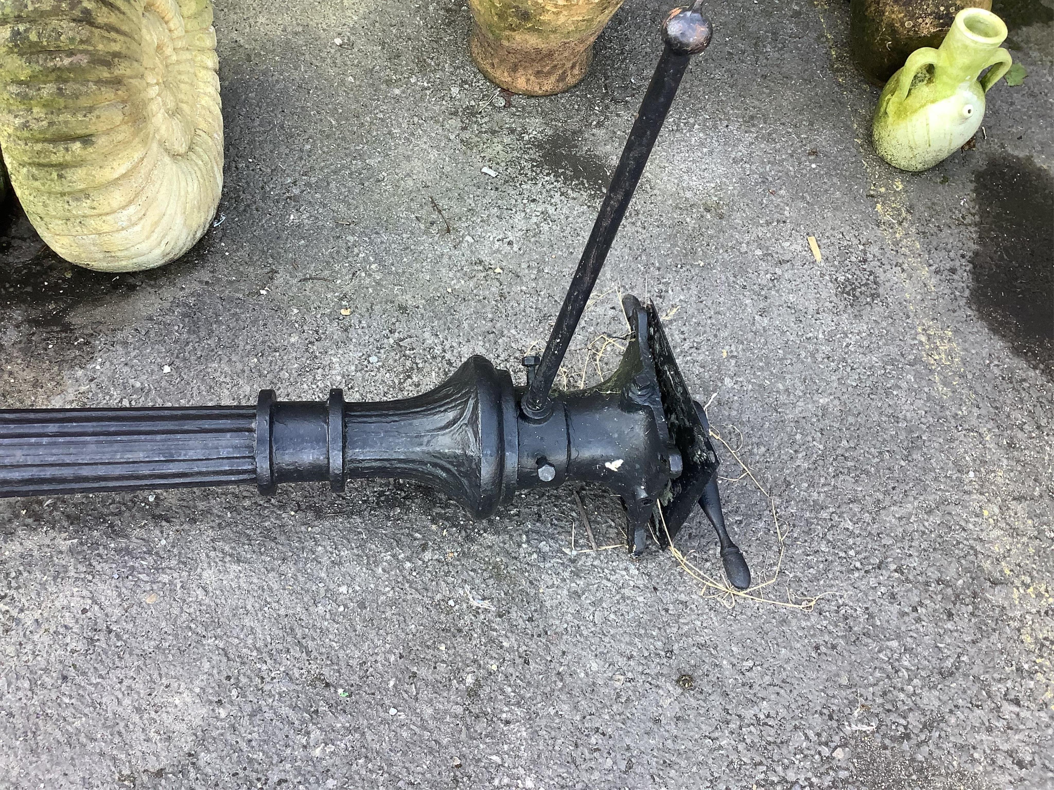 A Victorian style black painted cast iron street lamp, height including base 360cm. Condition - fair